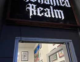 Enchanted Realm Tattoo